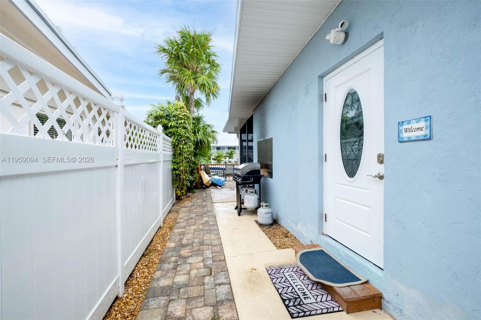 410 10th Street Key Colony Beach, FL 33051 - Photo 29 of 62 a view of entryway with wooden floor