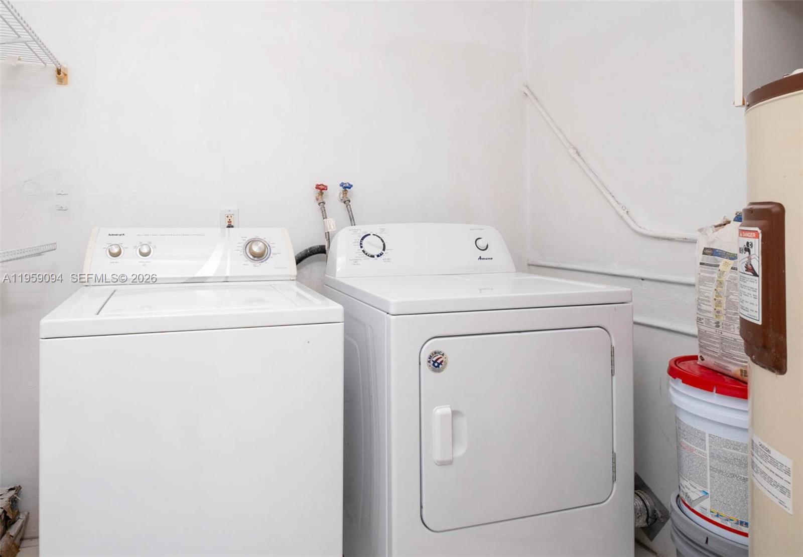 410 10th Street Key Colony Beach, FL 33051 - Photo 31 of 62 a utility room with dryer and washer