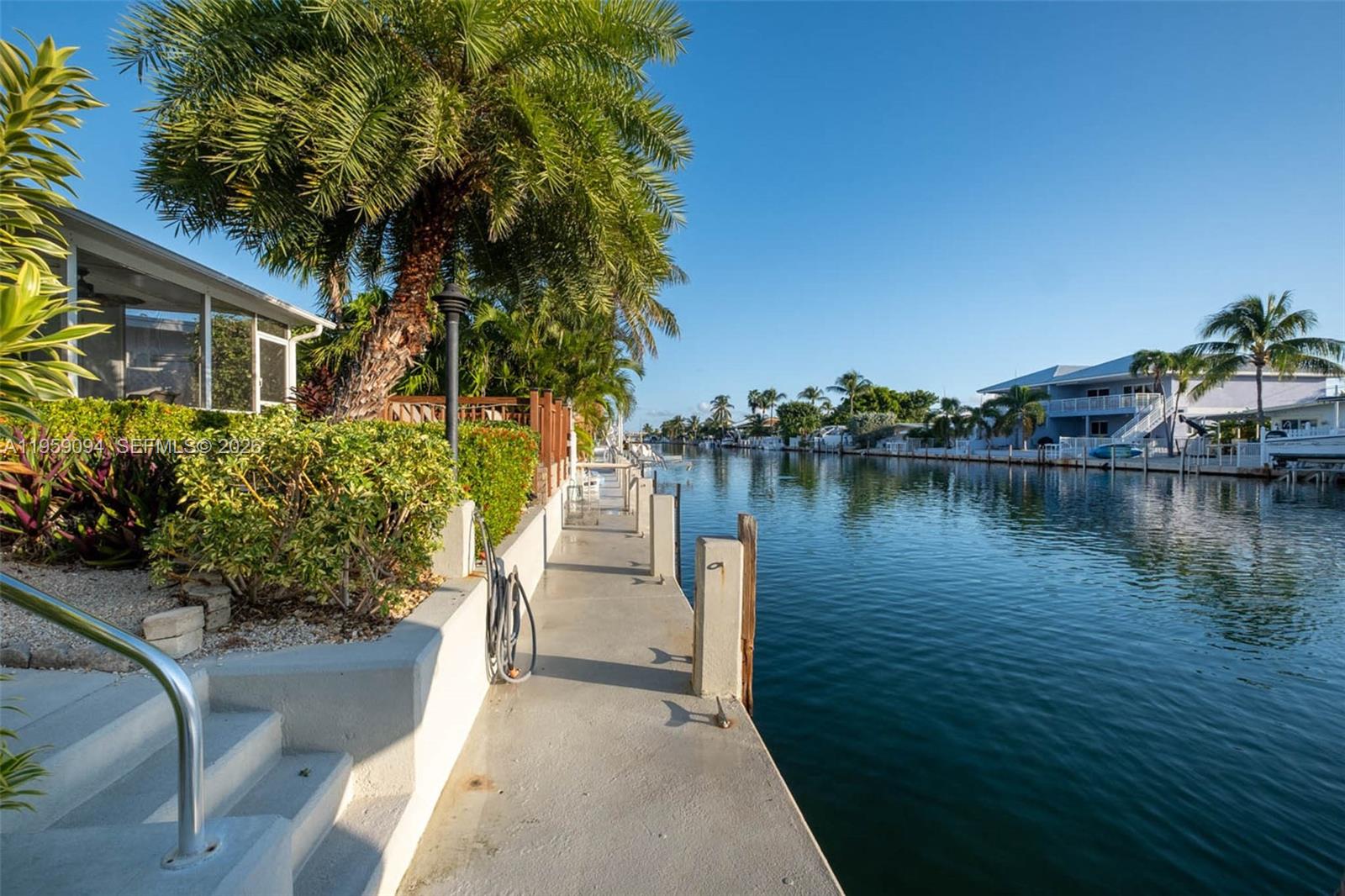 410 10th Street Key Colony Beach, FL 33051 - Photo 33 of 62 a view of a lake with houses