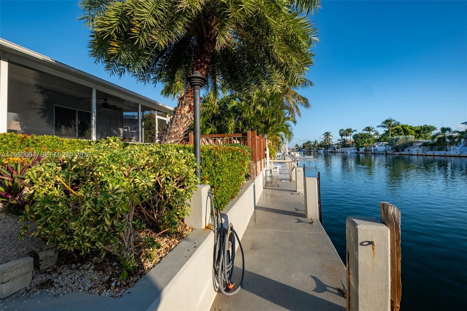 410 10th Street Key Colony Beach, FL 33051 - Photo 34 of 62 a view of a house with pool