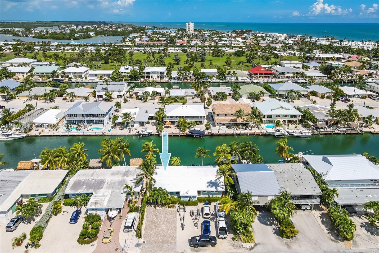 410 10th Street Key Colony Beach, FL 33051 - Photo 39 of 62 an aerial view of a house with a ocean view