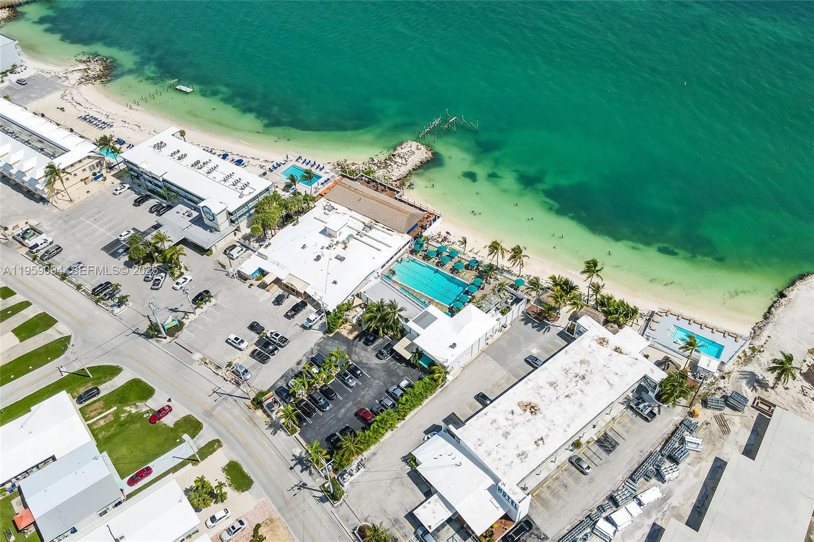 410 10th Street Key Colony Beach, FL 33051 - Photo 42 of 62 an aerial view of a house with a yard