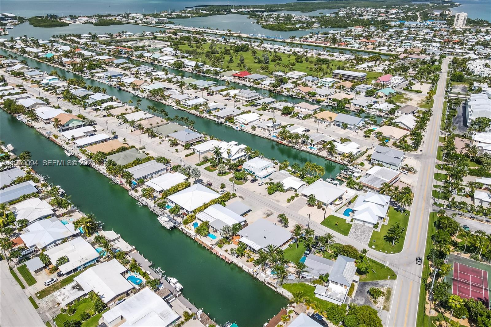 410 10th Street Key Colony Beach, FL 33051 - Photo 46 of 62 an aerial view of residential houses with outdoor space