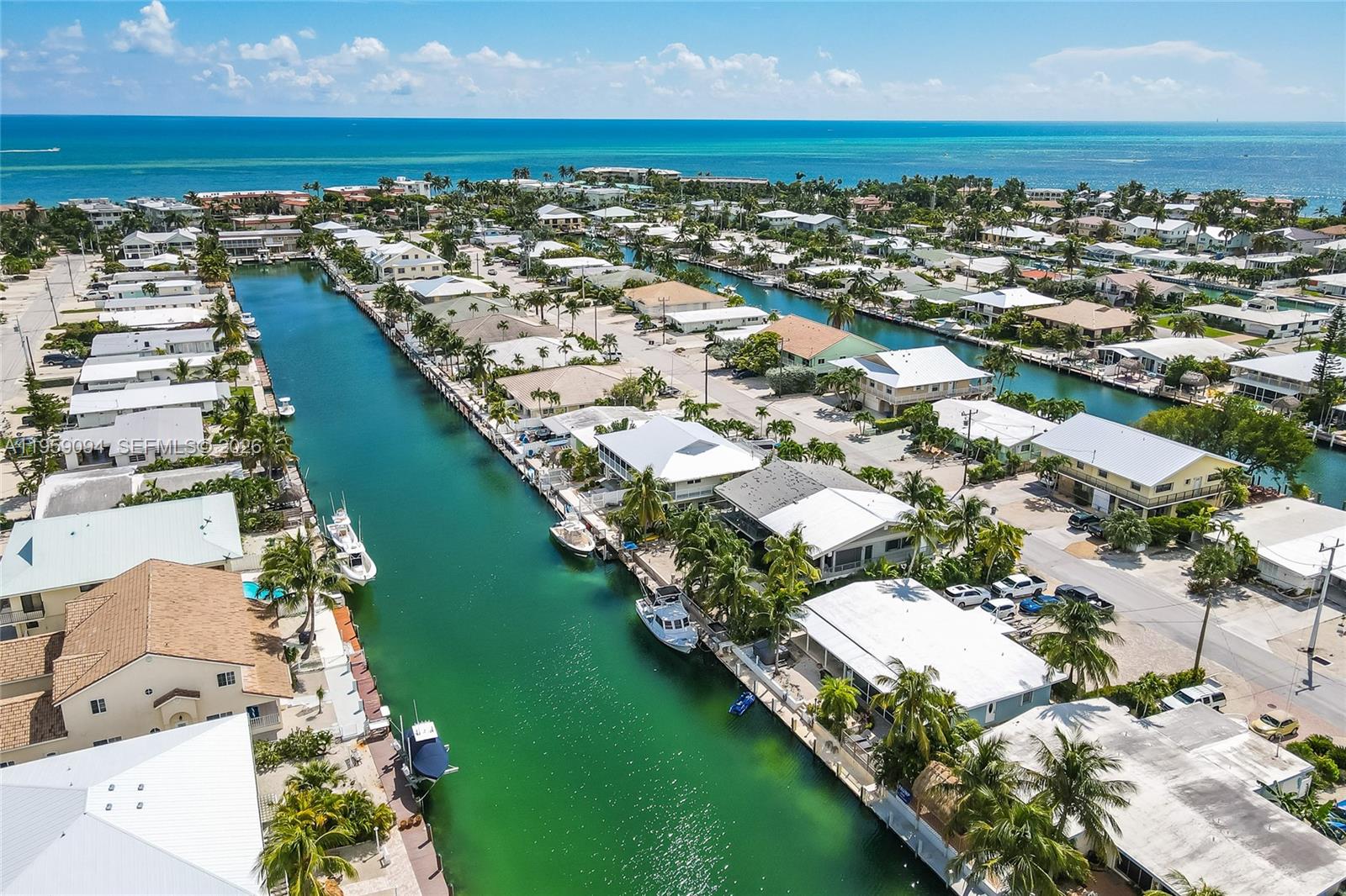 410 10th Street Key Colony Beach, FL 33051 - Photo 46 of 62 an aerial view of residential houses with outdoor space