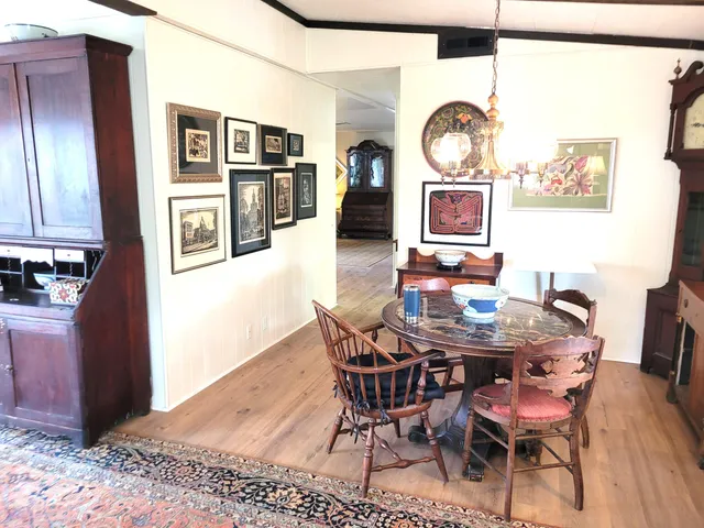 a view of a dining room with furniture