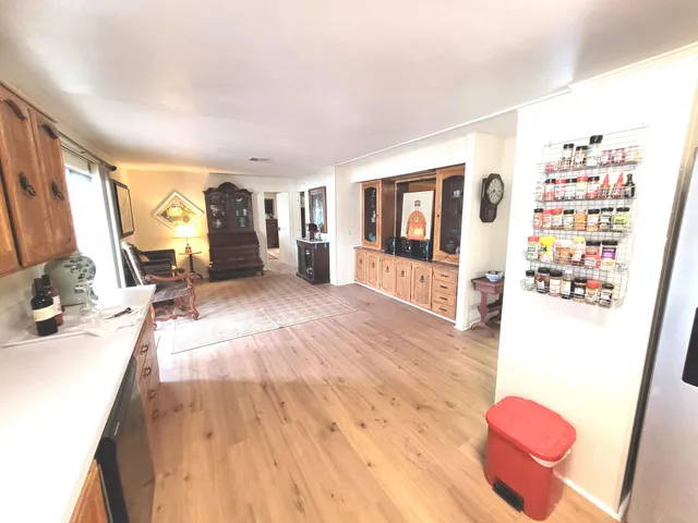 a spacious bathroom with a sink double vanity and a mirror