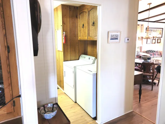 a bathroom with a sink a mirror and a shower