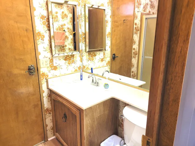 a workspace with furniture and a window