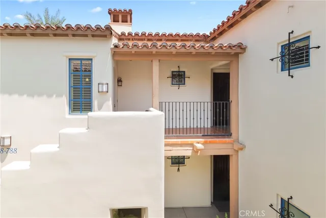 a view of a kitchen from a hallway