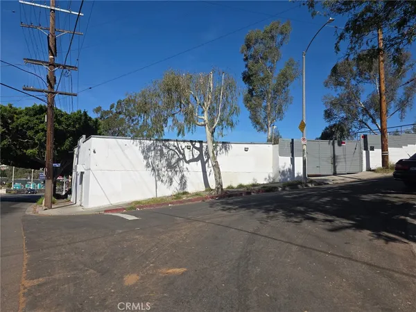 a view of multiple house with a street