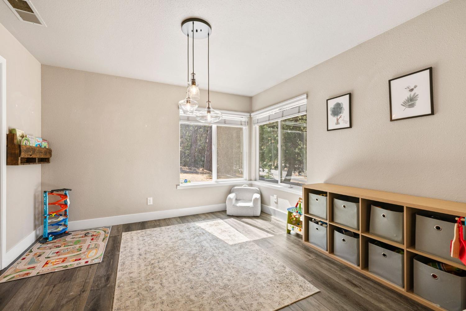 4842 Northern Lights Road Placerville, CA 95667 - Photo 11 of 26 a bedroom with furniture and a window