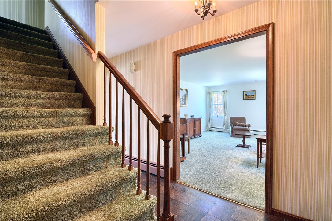 116 Lantern Lane Exeter, RI 02822 - Photo 31 of 48 There are hardwoods under carpet