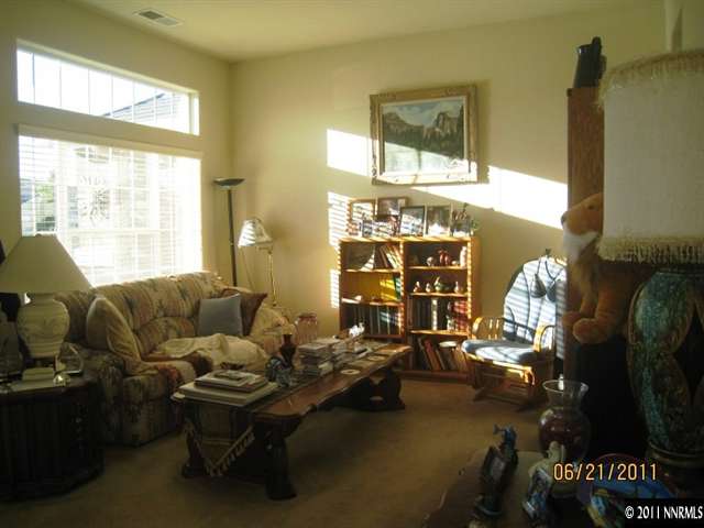 1664 Sewell Drive Reno, NV 89521 - Photo 8 of 13 a living room with furniture window and wooden floor