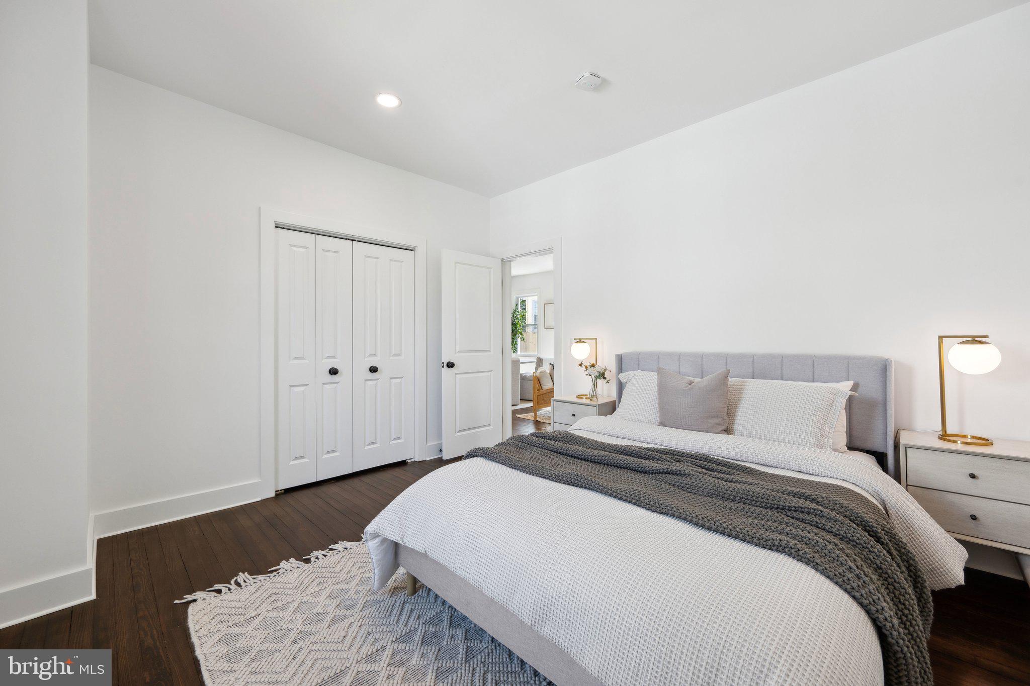4007 35th Street Mount Rainier, MD 20712 - Photo 16 of 49 a bedroom with bed and window