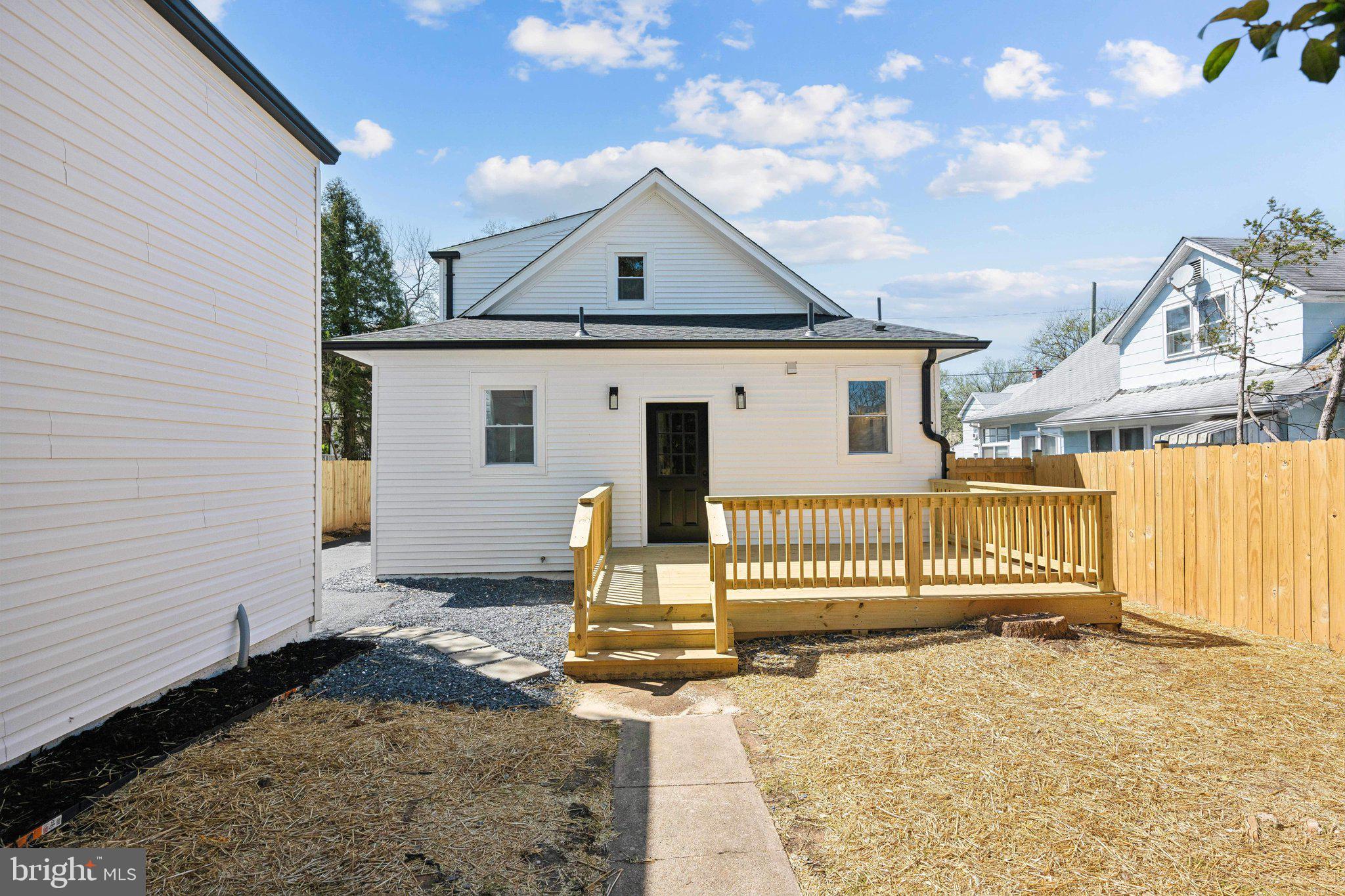 4007 35th Street Mount Rainier, MD 20712 - Photo 28 of 49 a front view of a house with a yard and garage