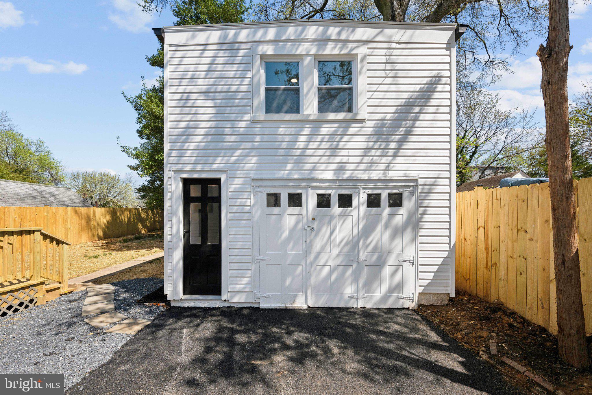 4007 35th Street Mount Rainier, MD 20712 - Photo 29 of 49 a front view of a house with a yard