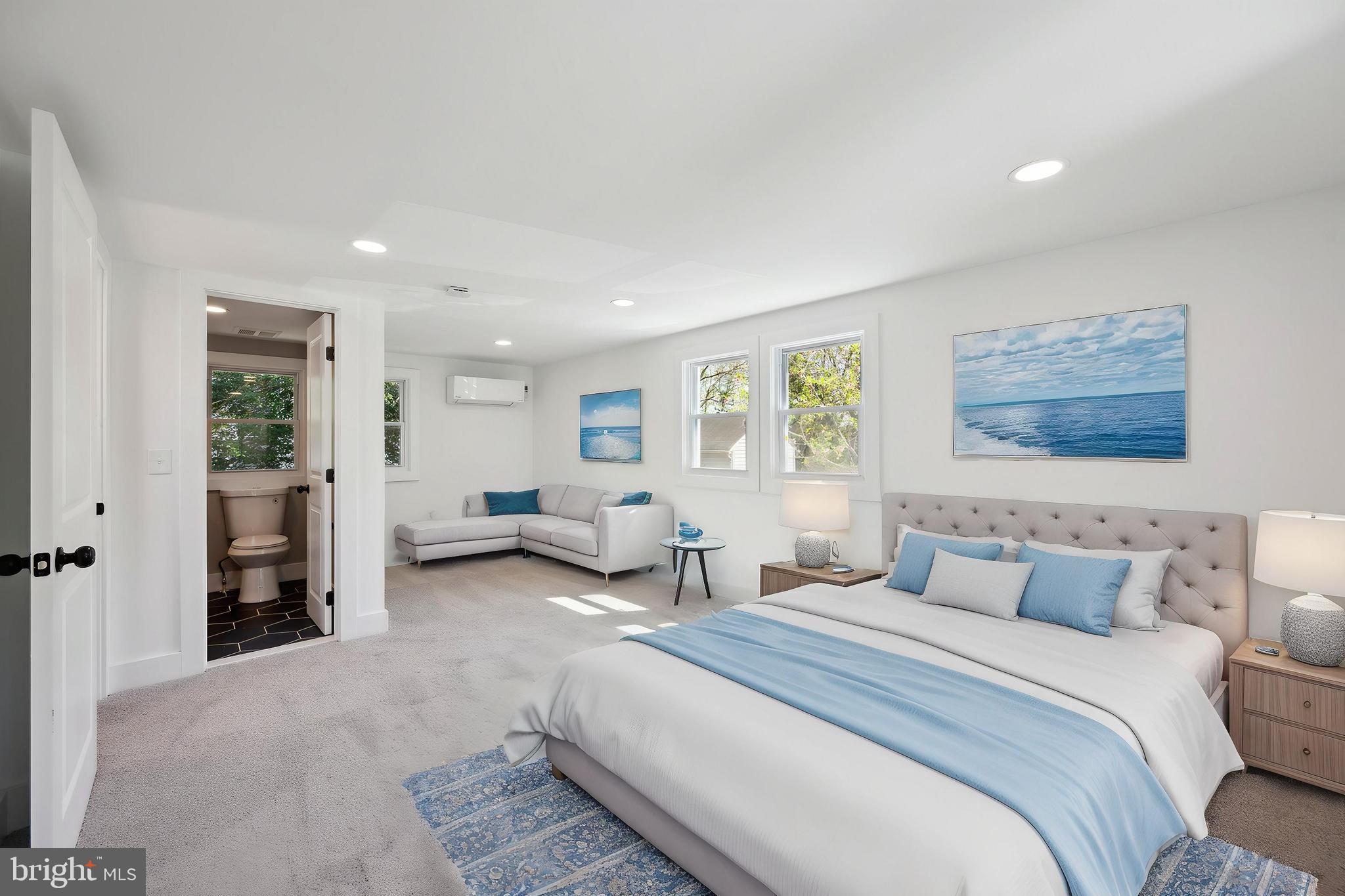 4007 35th Street Mount Rainier, MD 20712 - Photo 30 of 49 a spacious bedroom with a bed and furniture