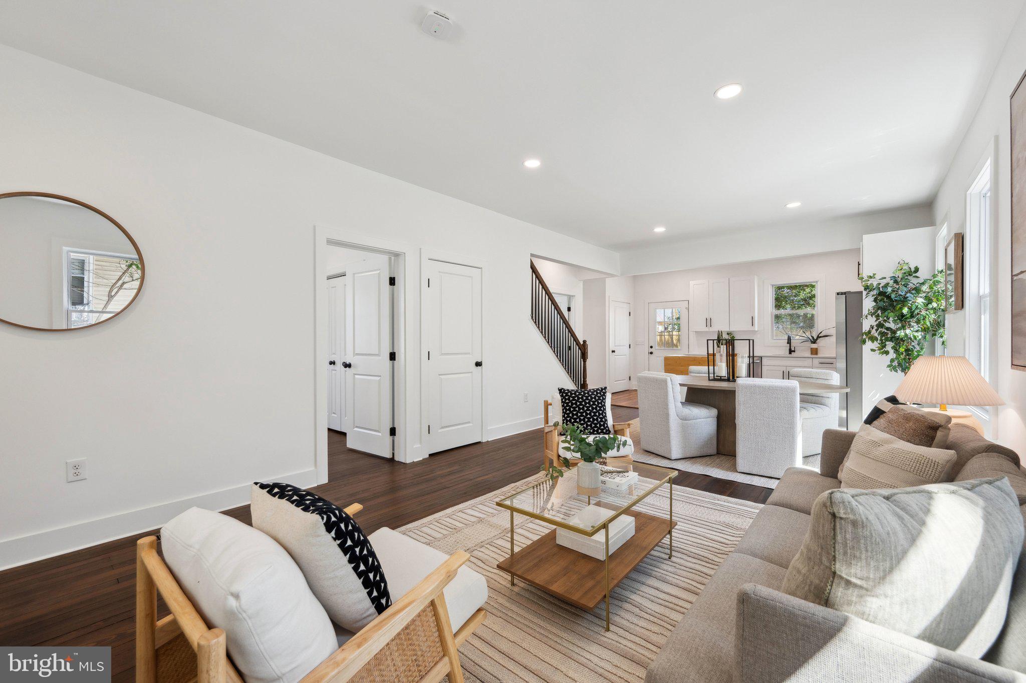 4007 35th Street Mount Rainier, MD 20712 - Photo 4 of 49 a living room with furniture fireplace and a window