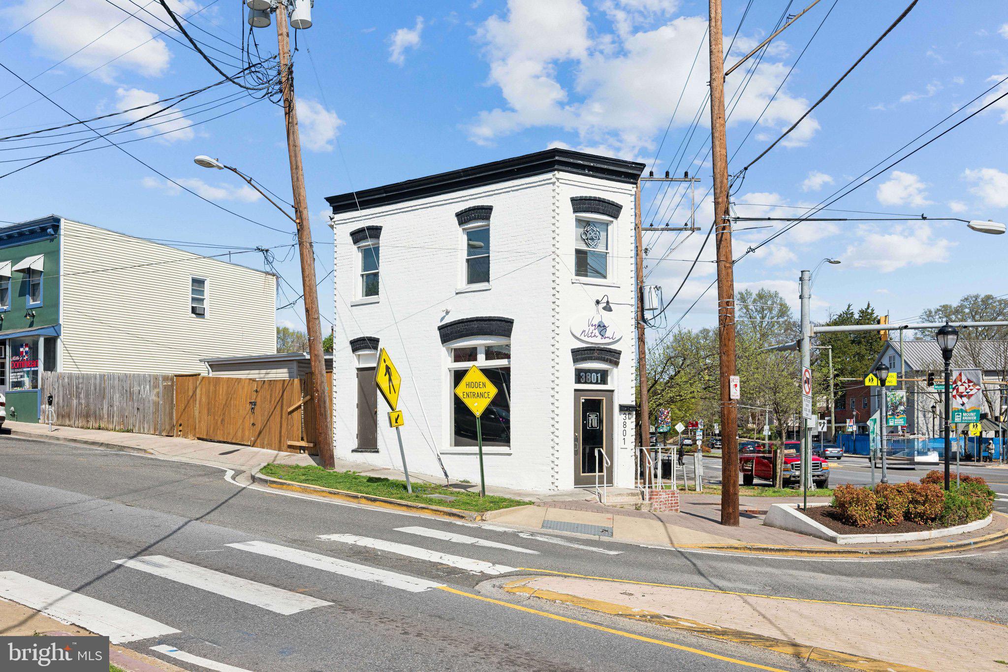 4007 35th Street Mount Rainier, MD 20712 - Photo 43 of 49 a view of a building with a umbrellas