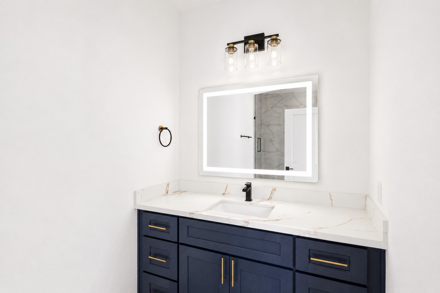 4606 Mallow Street, Unit A Houston, TX 77051 - Photo 15 of 21 a bathroom with a sink and a mirror