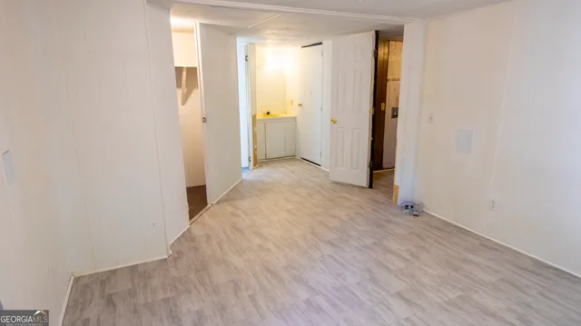 a view of a porch with wooden floor