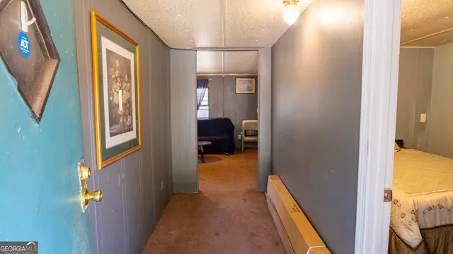 a bedroom with a bed and closet