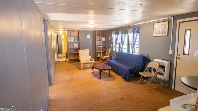 a room with furniture and a window