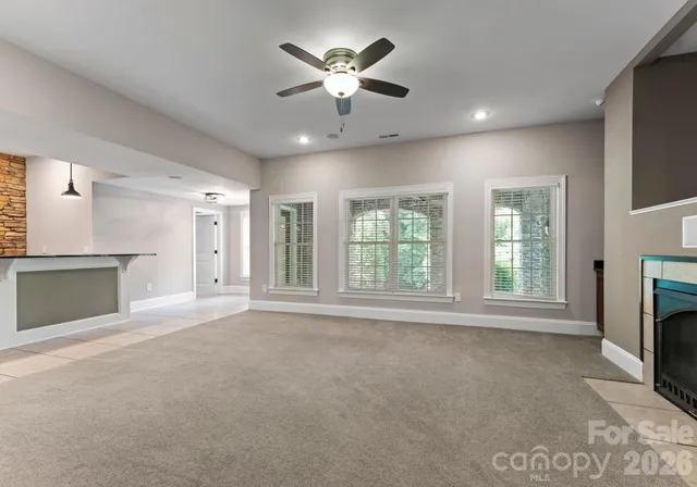 a kitchen with stainless steel appliances a sink stove and cabinets