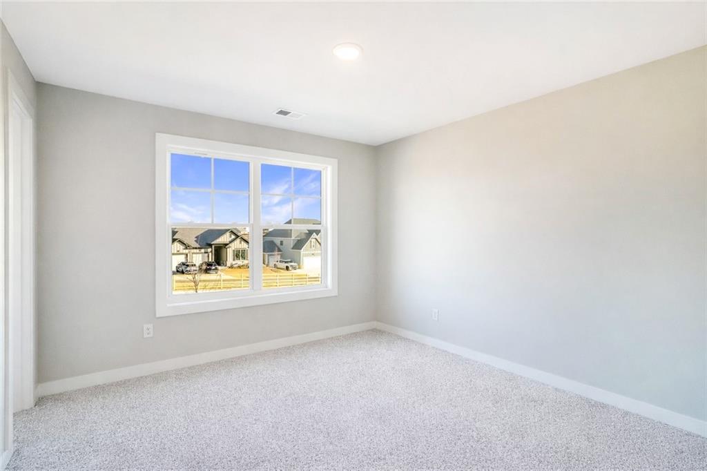 2596 Parkside Way Gainesville, GA 30507 - Photo 19 of 33 an empty room with windows