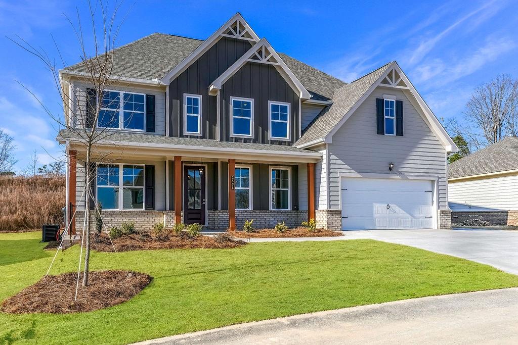 2596 Parkside Way Gainesville, GA 30507 - Photo 2 of 33 a front view of a house with a yard