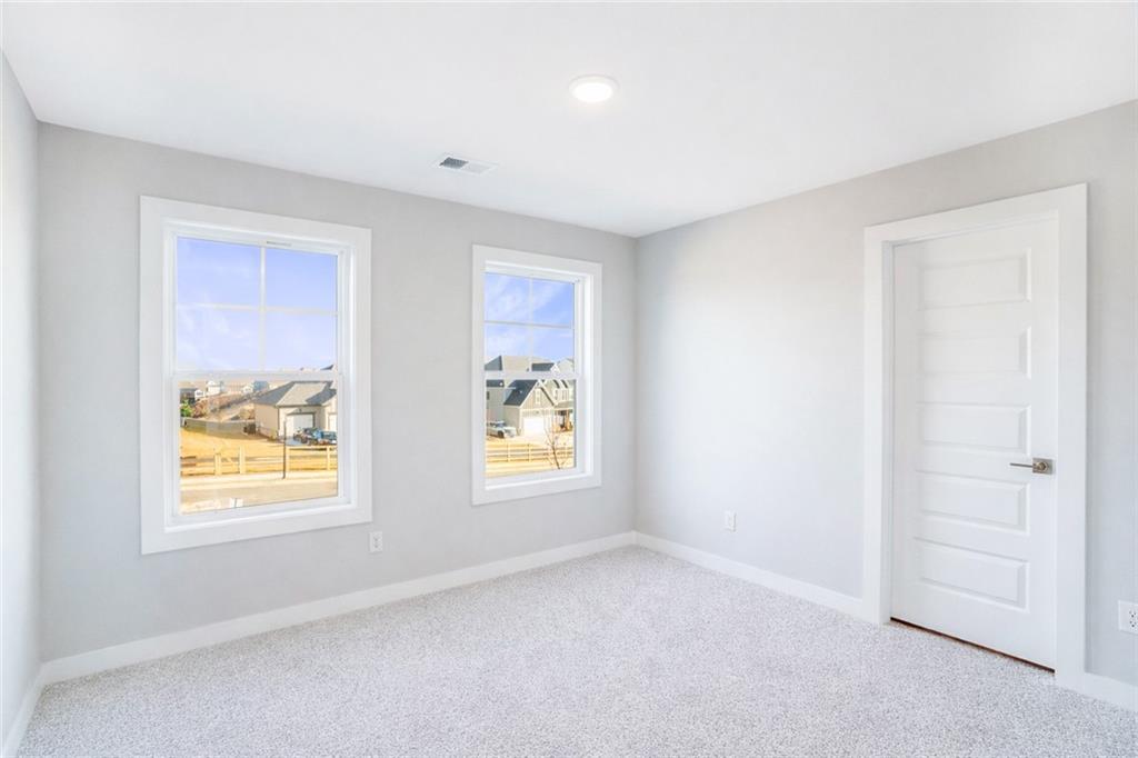 2596 Parkside Way Gainesville, GA 30507 - Photo 28 of 33 an empty room with windows