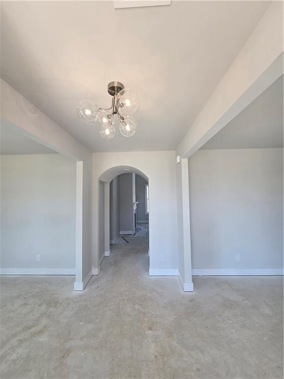 2596 Parkside Way Gainesville, GA 30507 - Photo 7 of 27 a view of a big room with chandelier fan