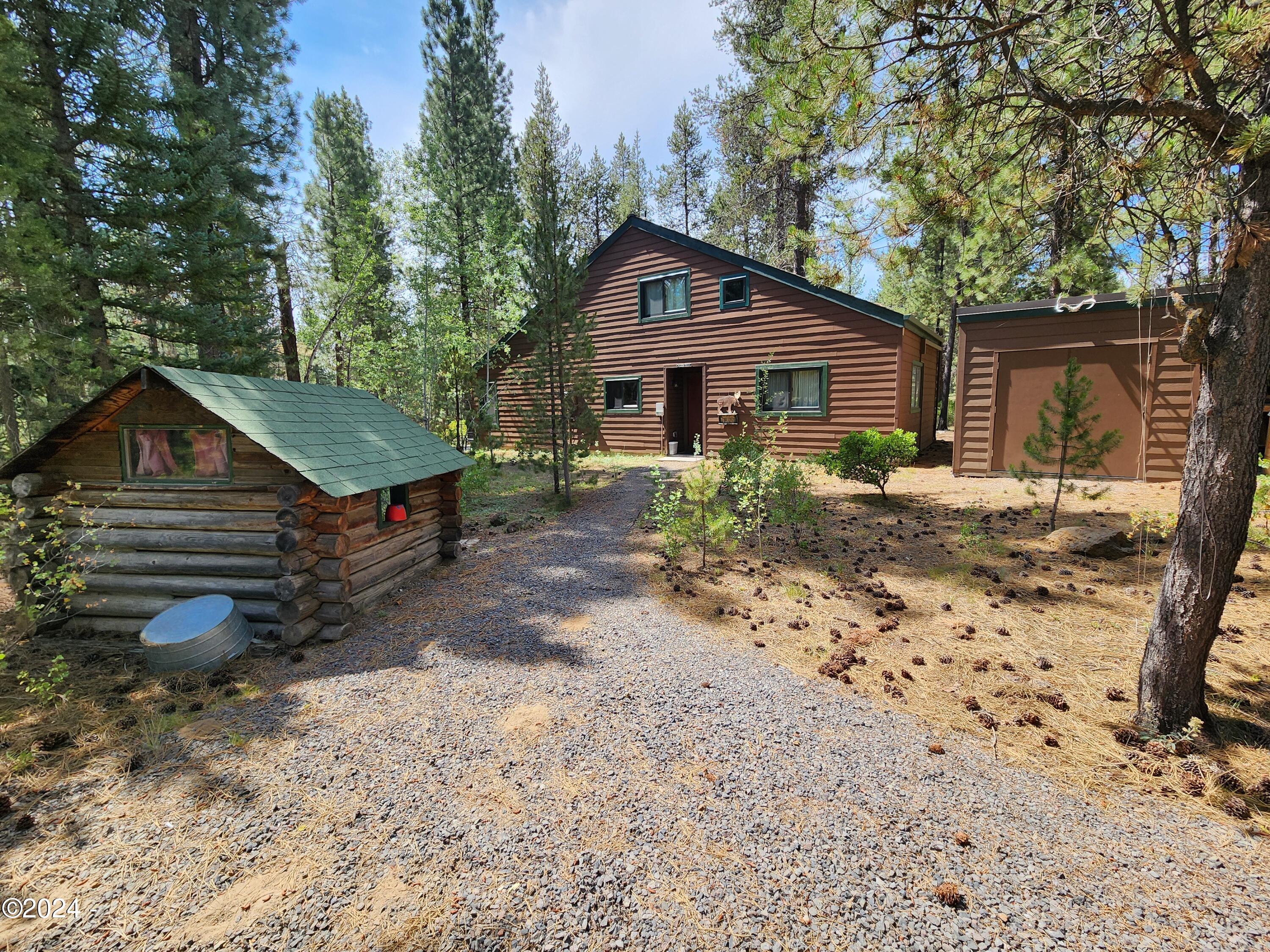 56986 Besson Road Bend, OR 97707 - Photo 3 of 27 Front from Driveway