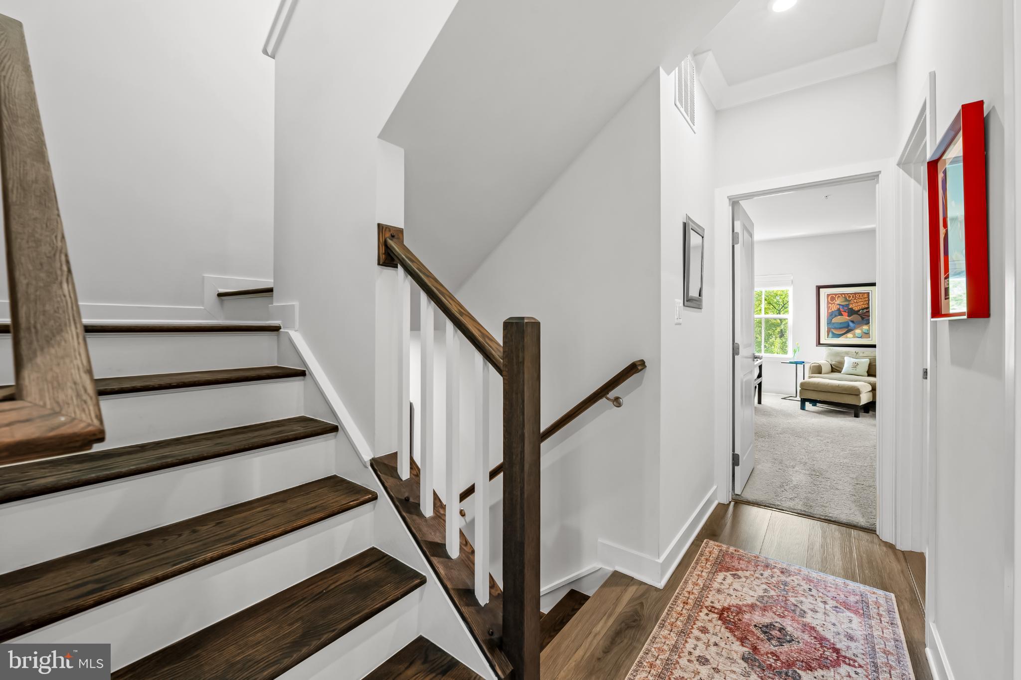 1526 Lowman Street Baltimore, MD 21230 - Photo 26 of 40 Inviting staircase leads to cozy living spaces.
