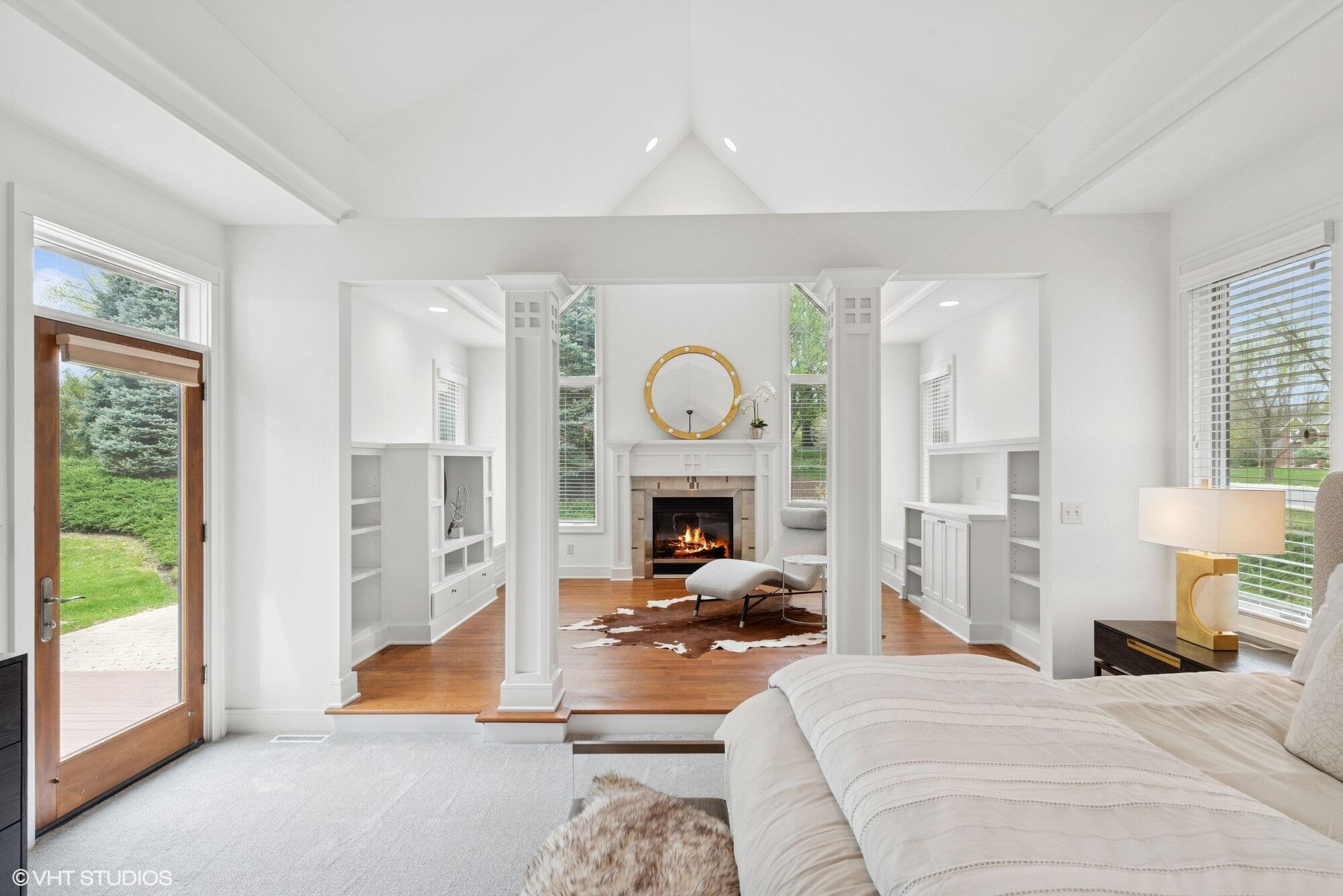 2252 Marrell Hill Road Valparaiso, IN 46385 - Photo 18 of 49 a bed room with a bed a table and a large window