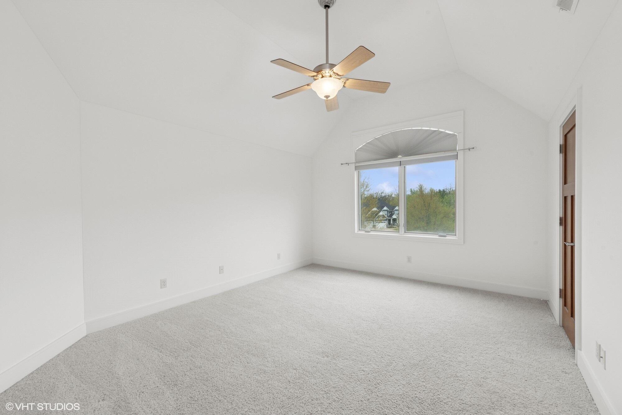 2252 Marrell Hill Road Valparaiso, IN 46385 - Photo 25 of 49 an empty room with a window and a fan