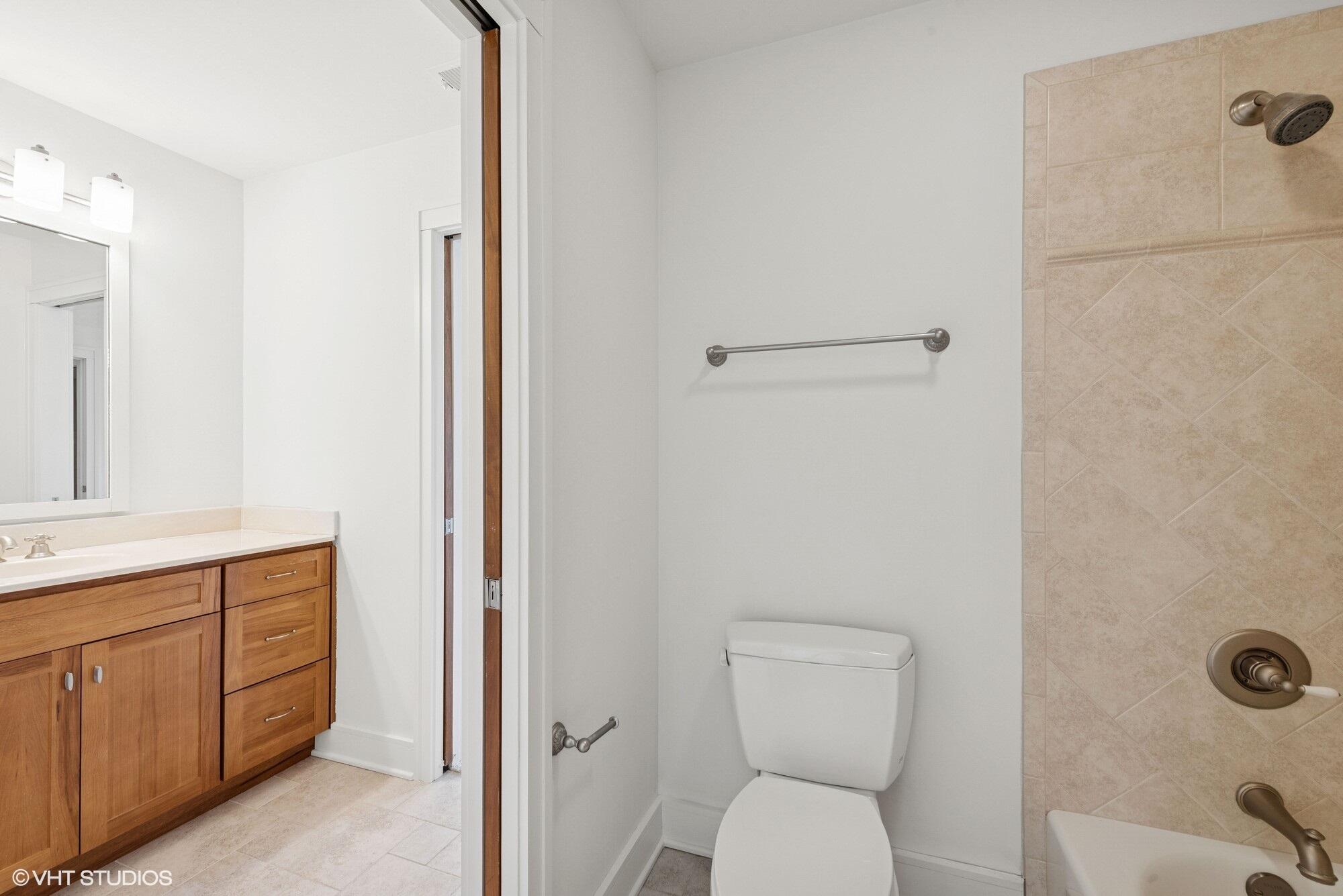 2252 Marrell Hill Road Valparaiso, IN 46385 - Photo 27 of 49 a bathroom with a toilet a sink and mirror