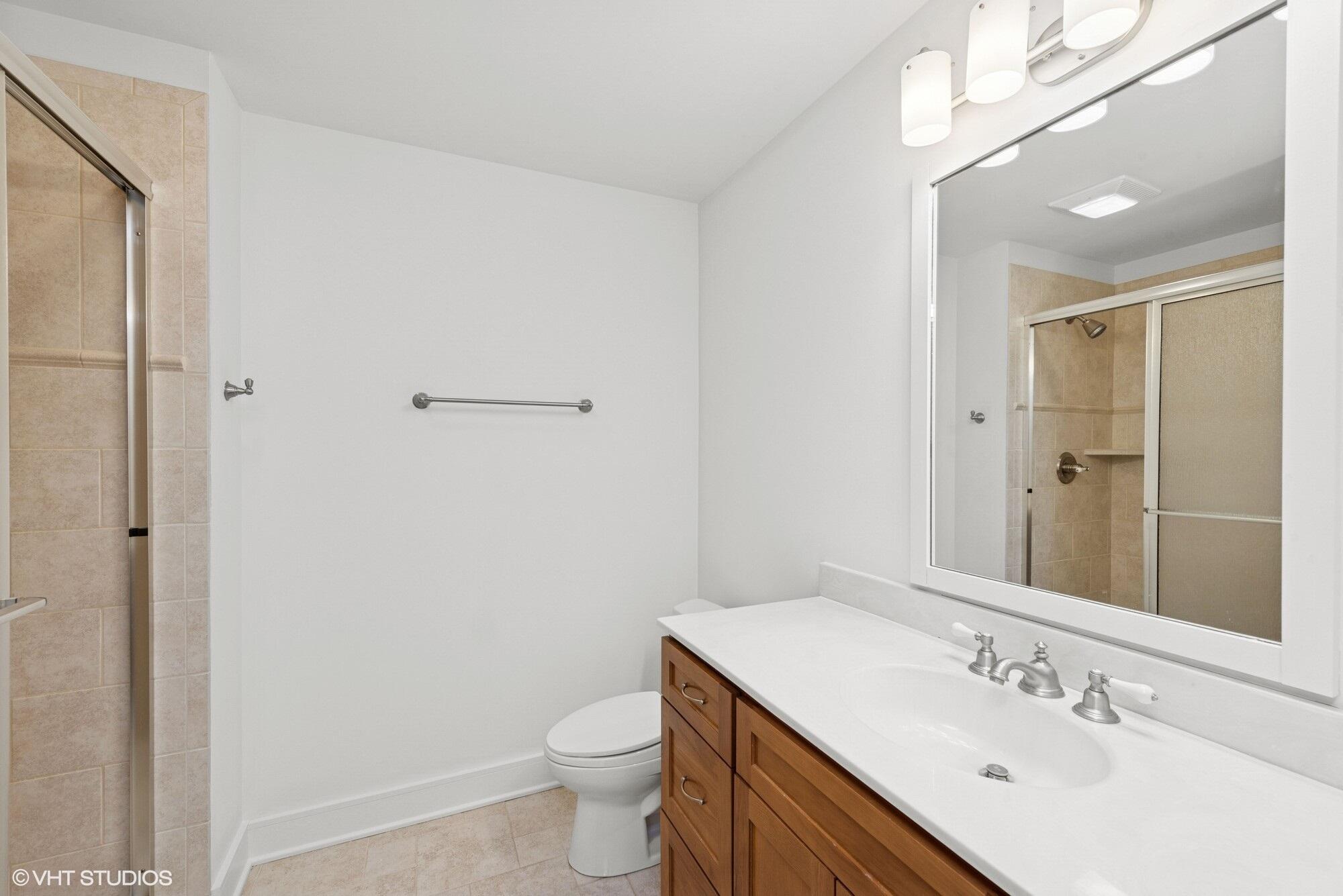 2252 Marrell Hill Road Valparaiso, IN 46385 - Photo 29 of 49 a bathroom with a sink toilet and vanity