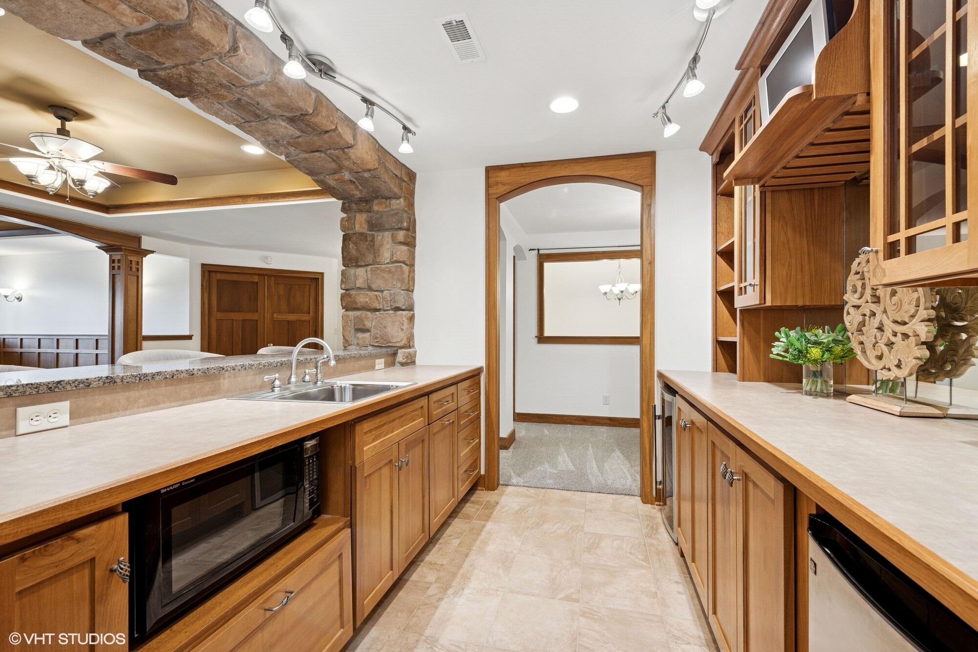2252 Marrell Hill Road Valparaiso, IN 46385 - Photo 32 of 49 a view of a kitchen cabinets a sink and dishwasher in a kitchen