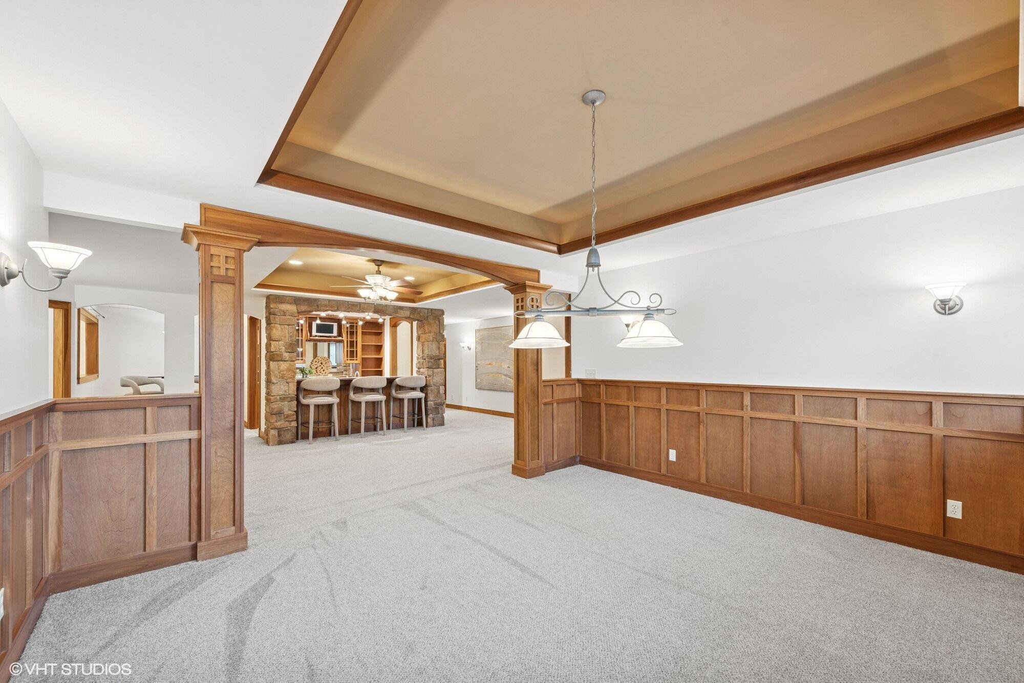 2252 Marrell Hill Road Valparaiso, IN 46385 - Photo 36 of 49 a view of a livingroom with furniture and a chandelier