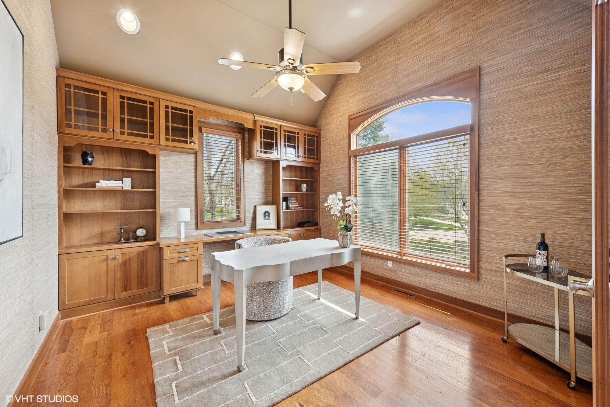 2252 Marrell Hill Road Valparaiso, IN 46385 - Photo 4 of 49 a living room with stainless steel appliances granite countertop furniture a fireplace and a large window