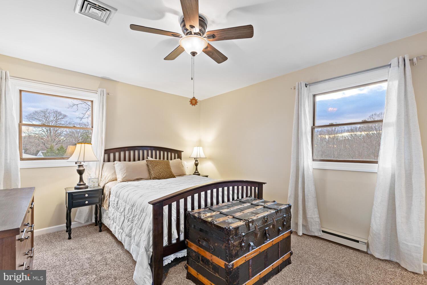 1573 Garrisonville Road Stafford, VA 22556 - Photo 14 of 63 a bedroom with a bed and a window