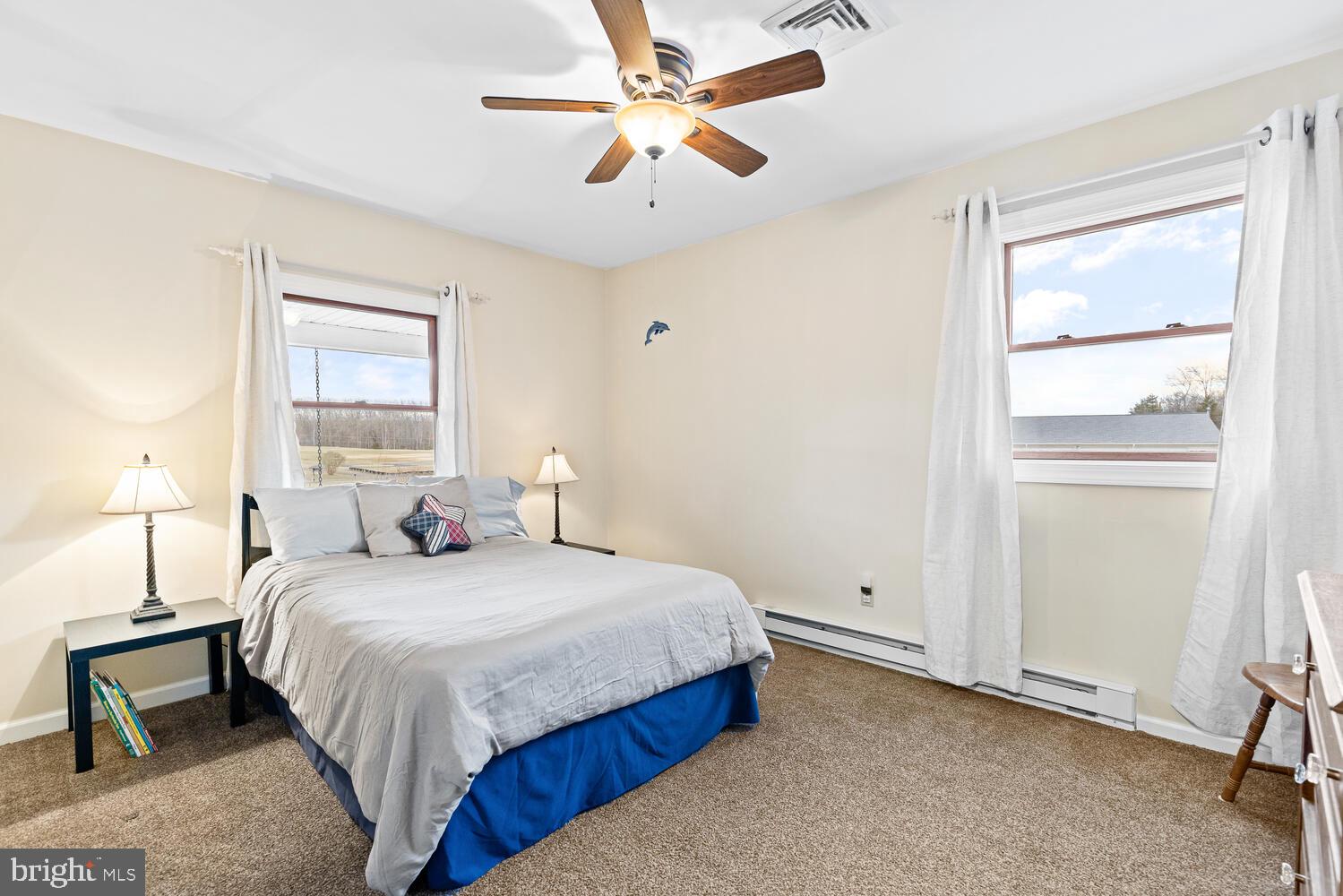 1573 Garrisonville Road Stafford, VA 22556 - Photo 17 of 63 a bedroom with a bed and a window