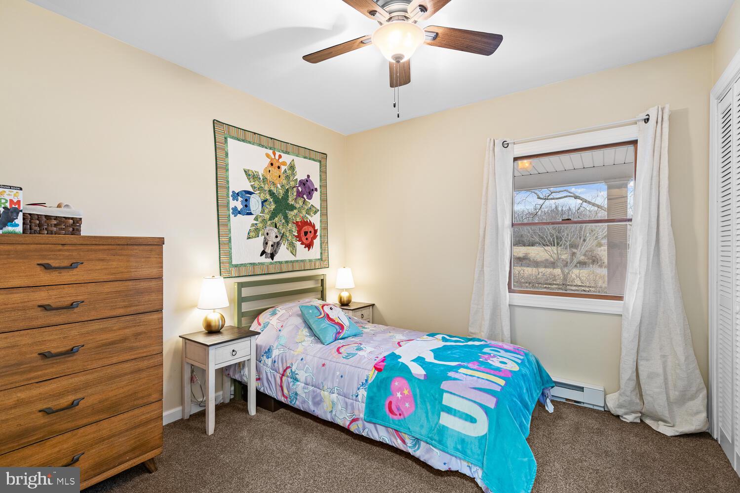 1573 Garrisonville Road Stafford, VA 22556 - Photo 18 of 63 a bedroom with a bed and a window