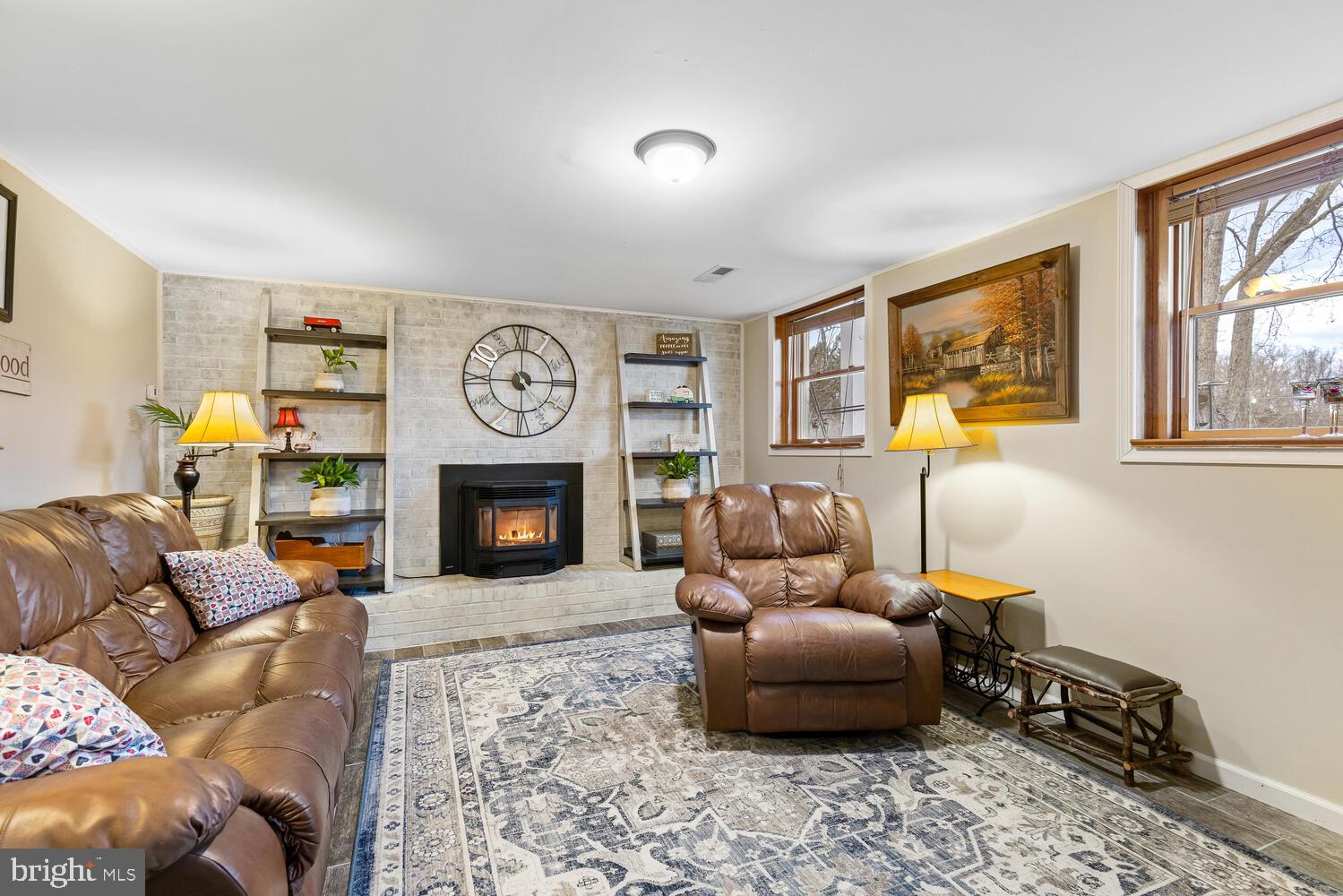 1573 Garrisonville Road Stafford, VA 22556 - Photo 20 of 63 a living room with furniture a window and a fireplace
