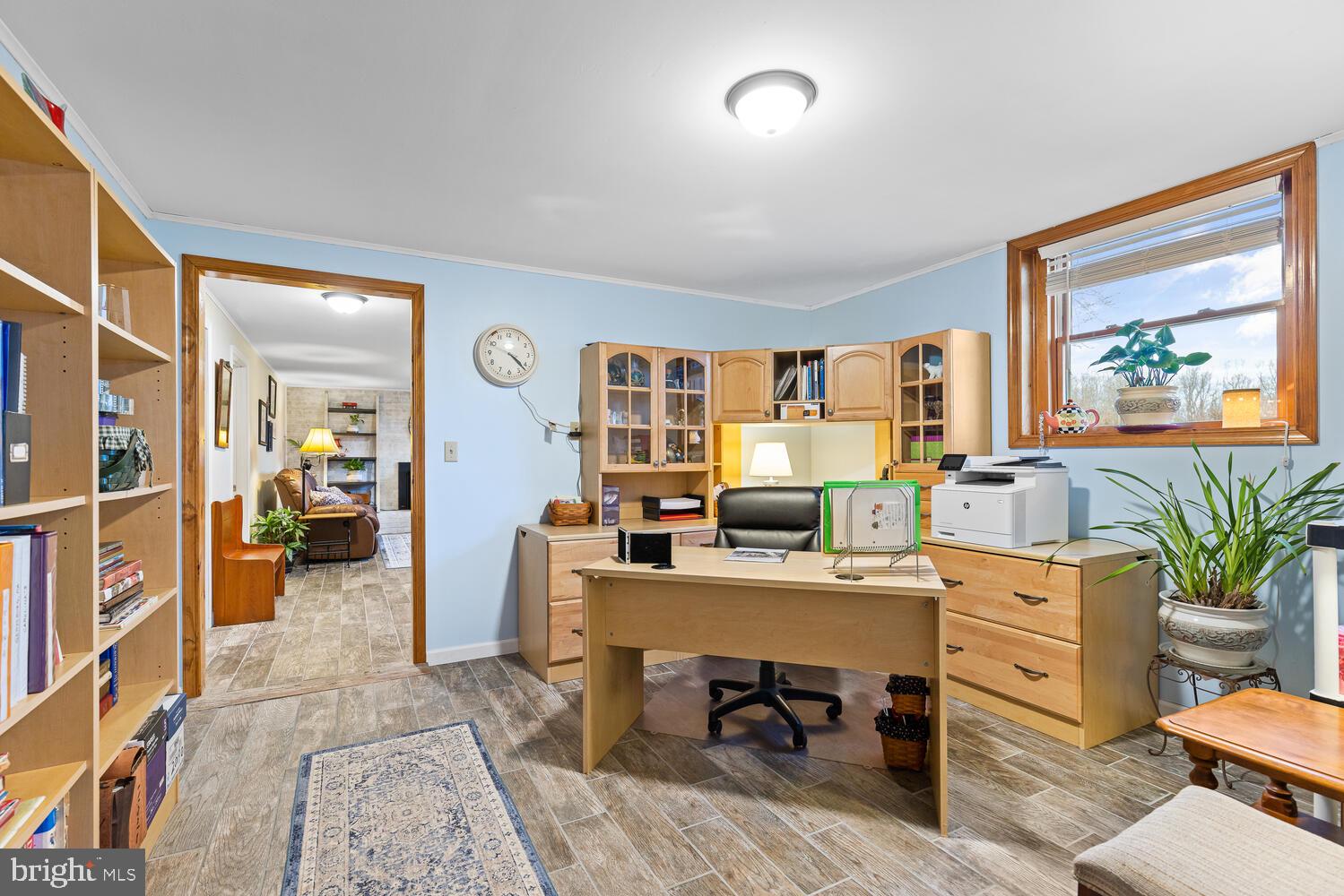 1573 Garrisonville Road Stafford, VA 22556 - Photo 24 of 63 a view of a workspace with furniture and a livingroom
