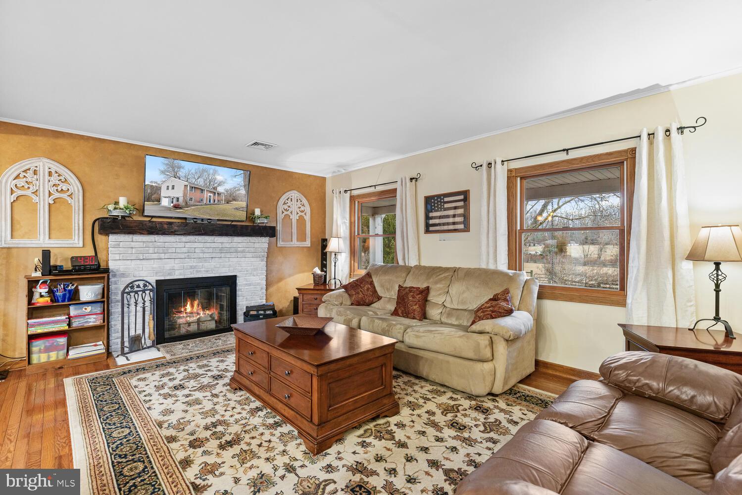 1573 Garrisonville Road Stafford, VA 22556 - Photo 5 of 63 a living room with furniture and a fireplace