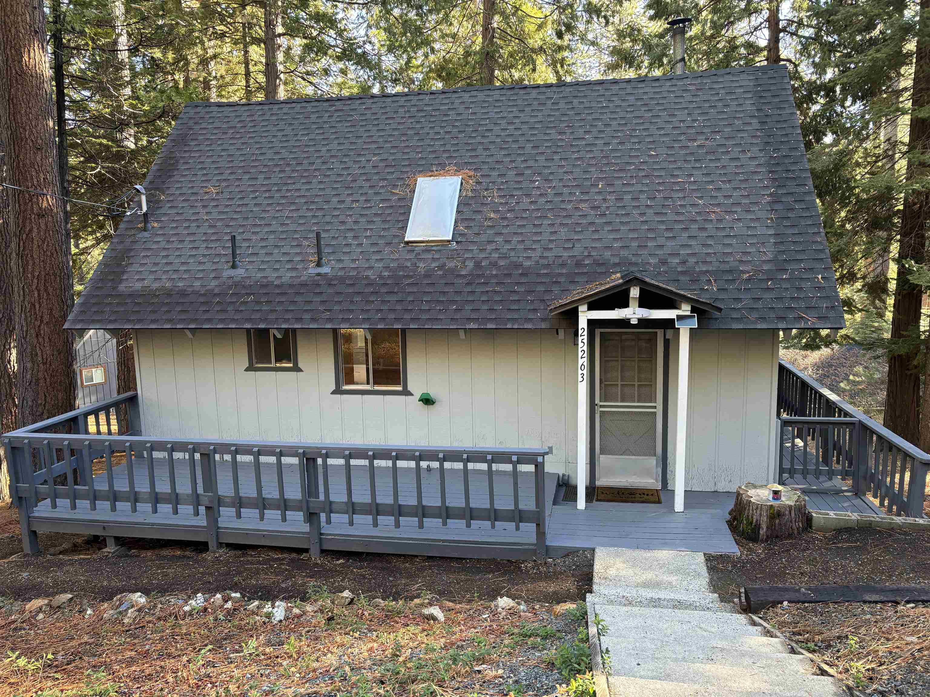 25263 Deborah Drive Long Barn, CA 95335 - Photo 1 of 1 a view of a house with wooden deck front of house