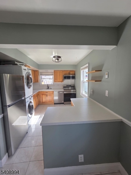 86 Bergen Turnpike, Unit A Ridgefield Park, NJ 07660 - Photo 6 of 14 a view of kitchen and living room