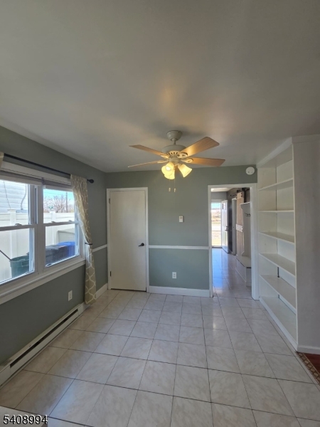 86 Bergen Turnpike, Unit A Ridgefield Park, NJ 07660 - Photo 8 of 14 wooden floor in an empty room with a window